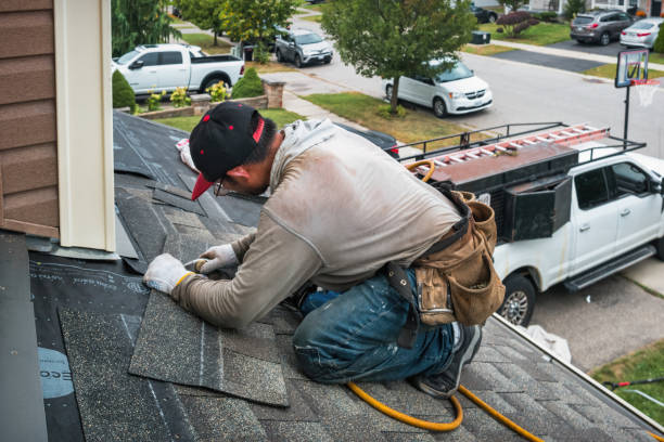 Professional Roofing technician working in Benson, MD